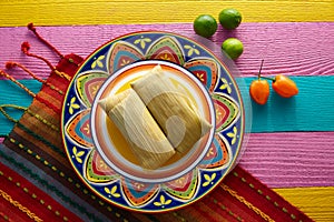 Mexican Tamale tamales of corn leaves photo