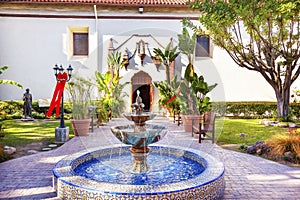 Mexican Tile Fountain Serra Statue Garden Mission San Buenaventura Ventura California photo