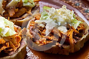 Mexican tinga sopes photo