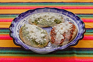 Mexican tlacoyos with green and red sauce, Traditional food in Mexico