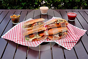 Mexican tortas and souces on the table