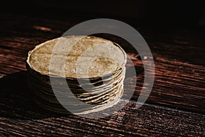 Mexican tortilla corn cob maize on wooden table in Mexico