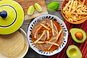 Mexican tortilla soup and aguacate photo