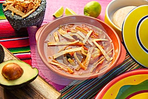 Mexican tortilla soup and aguacate photo