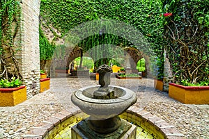 Mexican traditional fountain, tribute to the mining industry in colonial garden photo