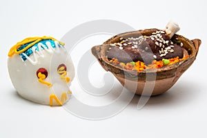 Mexican White Calaverita de azucar chocolate and Pollo Con Mole Candy photo