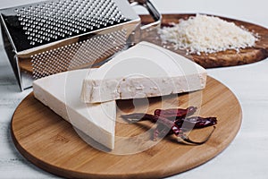 Mexican white Cotija cheese, tequila shot with fresh ingredients in Mexico Latin America