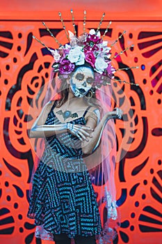 Mexican woman dressed and characterized as a catrina for the Day of the Dead