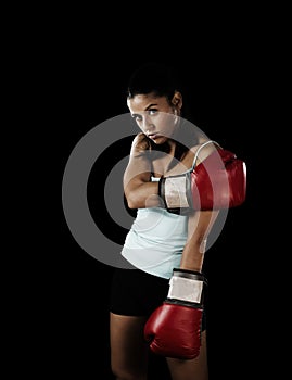 Mexican woman with girl red boxing gloves posing in defiant and competitive fight attitude