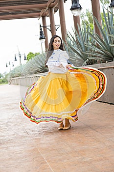 Mexican woman with typical dress. tequila, jalisco photo