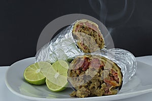 Mexican wrapped burrito and lemon photo