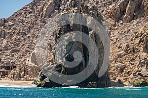 Rock at west end of Playa de los Amantes, Cabo San Lucas, Mexico photo