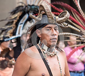 Mexico City, Mexico - April 30, 2017. Aztec dancers dancing in Zocalo square