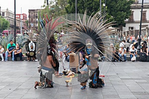 Mexico City, Mexico - April 30, 2017. Aztec dancers dancing in Zocalo square