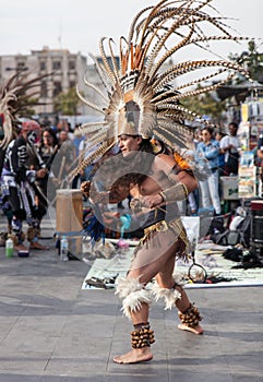 Mexico City, Mexico - April 30, 2017. Aztec dancers dancing in Zocalo square