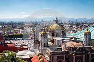 Mexico City, Mexico, Basilica of Our Lady of Guadalupe with Mexico City Skyline on a Sunny Day