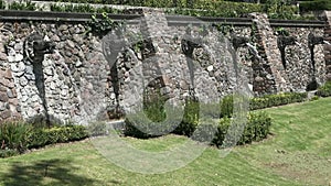 Mexico city, fountain in the shape of snake heads, water falling from the mouths of feathered serpents, public gardens