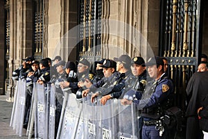 Mexico City, Mexico - November 24, 2015: Mexican Police Officers in Riot Gear outside building in Zocalo Square, Mexico City