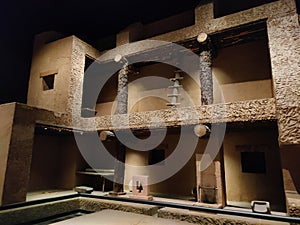 MEXICO CITY, MEXICO--A reconstructed earthen house from the city of Paquime located in the National Museum of Anthropology. photo