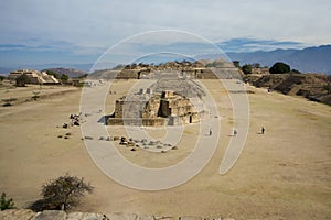 Mexico Oaxaca Monte Alban central square with sellers and cloudy photo