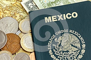 Mexico passport with world currency over a map