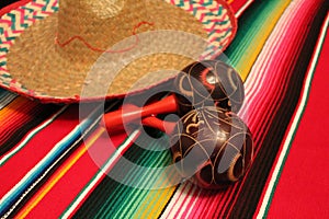 Mexico poncho sombrero maracas background fiesta cinco de mayo decoration bunting photo