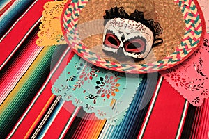 Mexico poncho sombrero skull background fiesta cinco de mayo photo