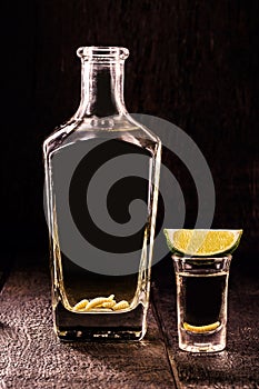 Mezcal or mescal is commonly known as photo