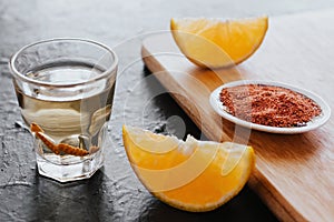 Mezcal shot with chili salt and agave worm, mexican drink in mexico photo