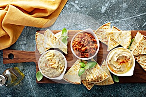 Mezze board with pita and dips photo