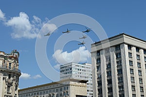 Mi-35M attack helicopters in the sky over Moscow during the parade dedicated to the 75th anniversary of Victory in the Great Patri photo