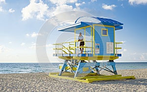 Miami beach, Asian women on the beach at Miami beach, life guard hut Miami beach Florida