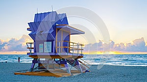 Miami beach, couple on the beach at Miami beach, life guard hut Miami beach Florida