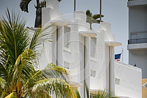 Miami Beach deco architecture building and palm trees