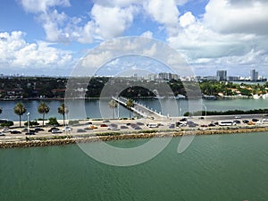 Miami Beach downtown coast bridge palms highway and skyscrappers view from the deck of the cruise ship, Florida, US photo