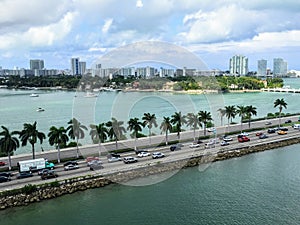 Miami Beach downtown coast palms highway and skyscrappers view from the deck of the cruise ship, Florida, US photo