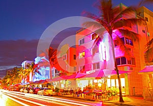 Miami Beach, Florida Moving traffic hotels and restaurants at sunset on Ocean Drive