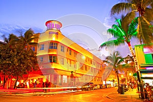 Miami Beach, Florida Moving traffic hotels and restaurants at sunset on Ocean Drive