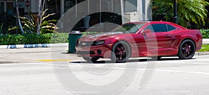 Miami Beach, Florida USA - April 15, 2021: red Chevrolet Camaro sportscar, corner view