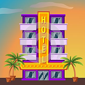 Miami Beach Hotel building with palm trees at sunset