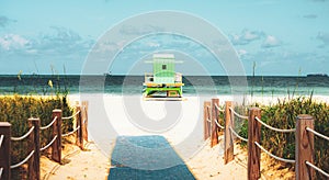 Miami Beach Lifeguard Stand in the Florida sunshine. Sunny summer day, with blue sky and Atlantic Ocean.