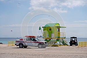 Miami Beach spring break 2021 scene lifeguard tower and ocean rescue vehicle