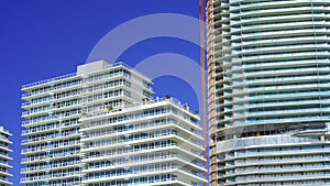 Miami Beach tower buildings on blue sky HDR 4k prores raw