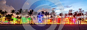 Miami Beach, USA - September 10, 2019: Panorama of Ocean Drive hotels and restaurants at sunset. City skyline with palm