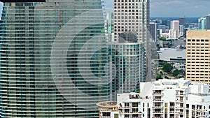 Miami city reflections in glass skyscraper building in financial downtown district in Florida, USA. American urban