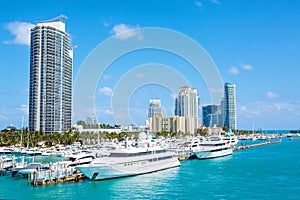 Miami, Florida, USA downtown skyline. Building, ocean beach and blue sky. Beautiful city of United States of America photo
