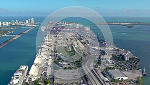 Miami, Florida, Usa - January 2019: Aerial drone view flight over Miami sea port. Ships and cruise liners at the pier.