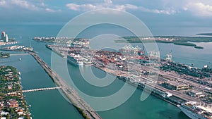 Miami, Florida, Usa - January 2019: Aerial drone view flight over Miami sea port. Ships and cruise liners at the pier.