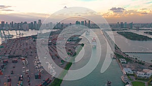 MIAMI, FLORIDA, USA - JANUARY 2019: Aerial drone view flight over Miami sea port. Ships and cruise liners at the pier.