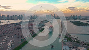 MIAMI, FLORIDA, USA - JANUARY 2019: Aerial drone view flight over Miami sea port. Ships and cruise liners at the pier.